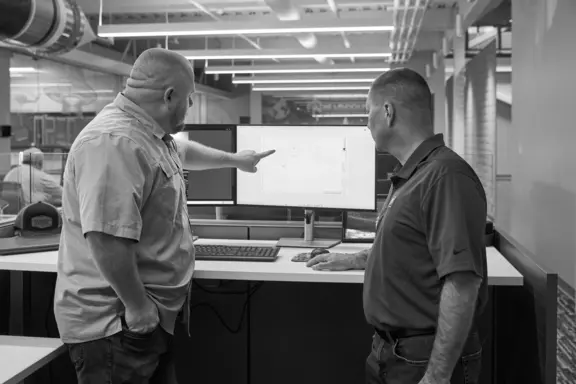 2 Engineers review plans